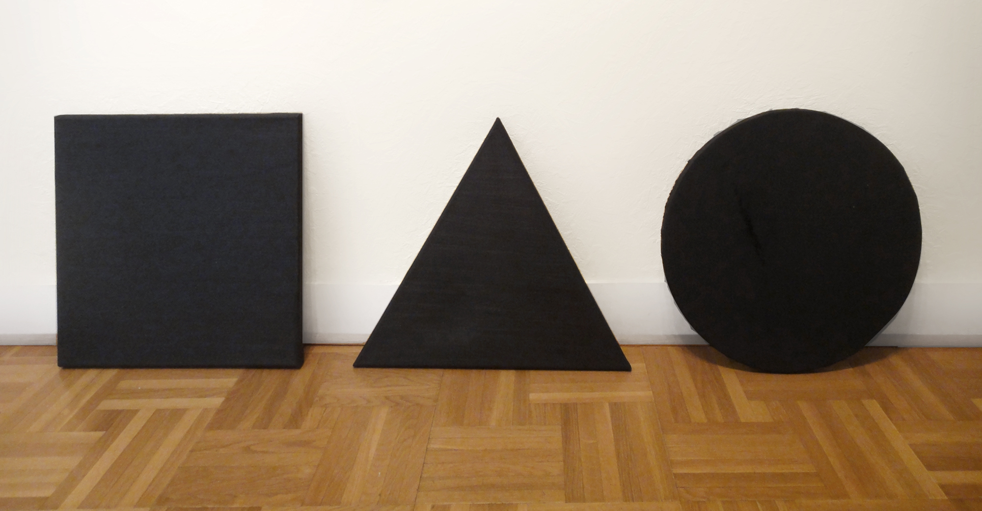 CARRE NOIR, TRIANGLE NOIR, CERCLE NOIR TRIPTYQUE NOIR (2012) 40 x 40cm (Square) 40 x 40 x 40cm (Triangle) 40cm ⌀ (Circle) 15 3/4" x 15 3/4" Each Oil on Canvas (Private Collection)